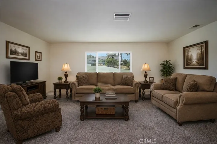 This picture has been digitally enhanced to show vacant space with furniture.
