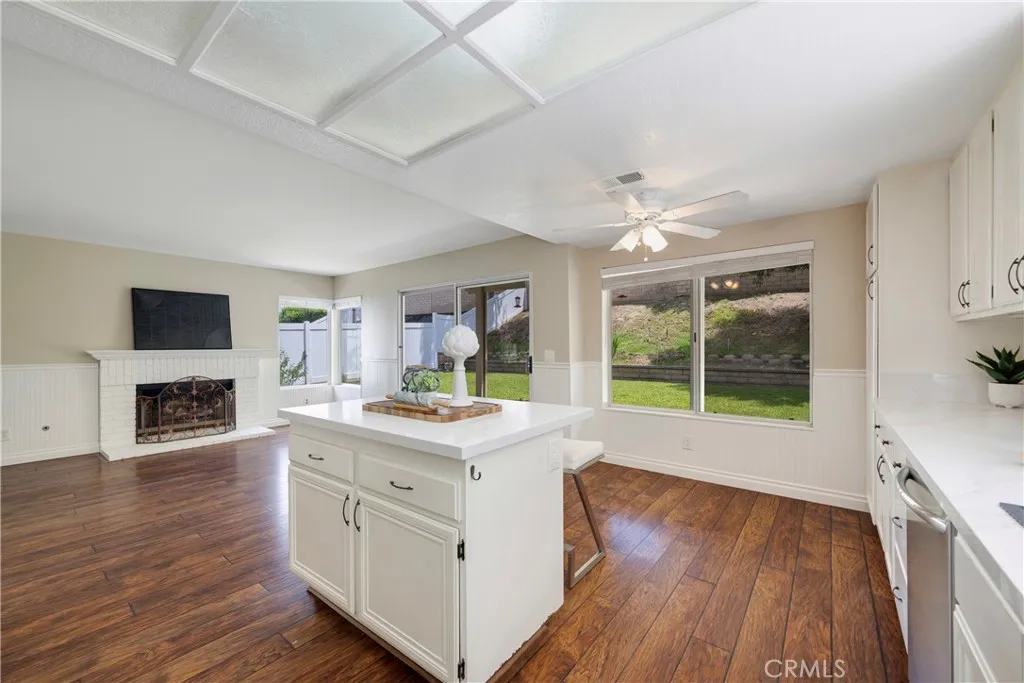 Kitchen has views to backyard.