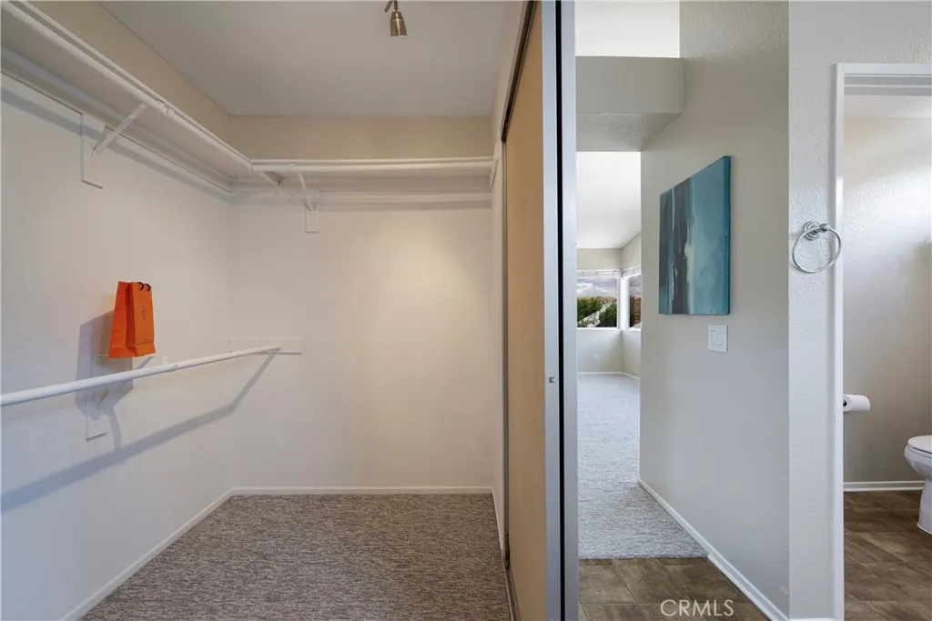 Primary walk in closet in in primary bath area.