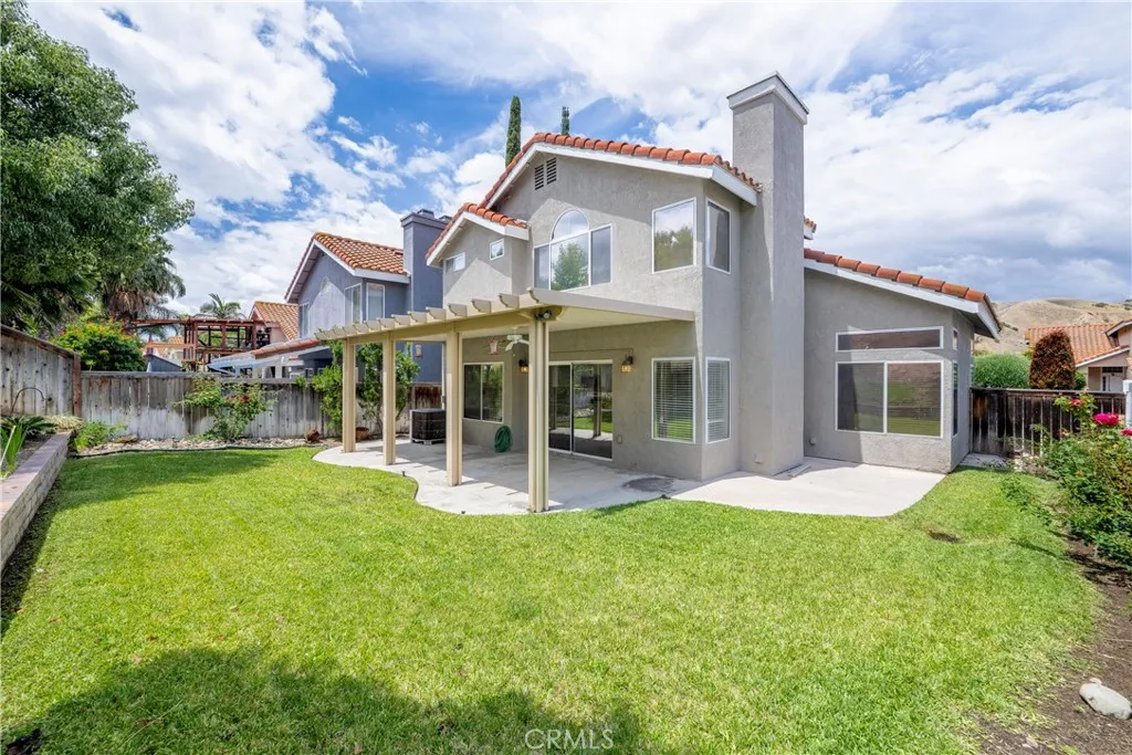 Large grassy back yard for a variety of family fun activities.