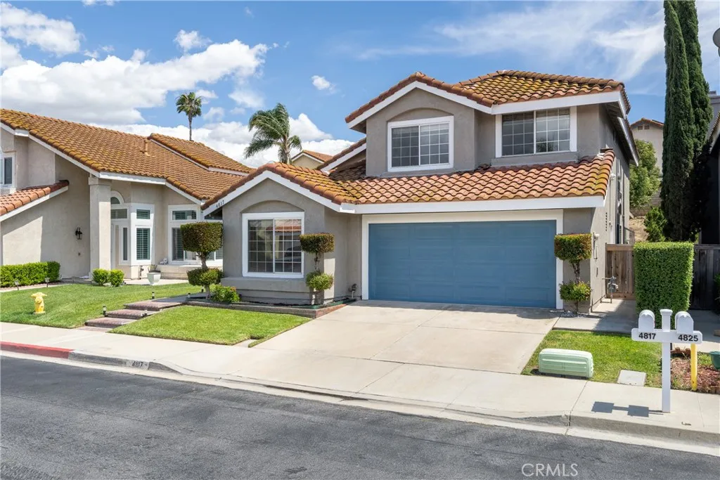 This home boasts pristine landscaping.