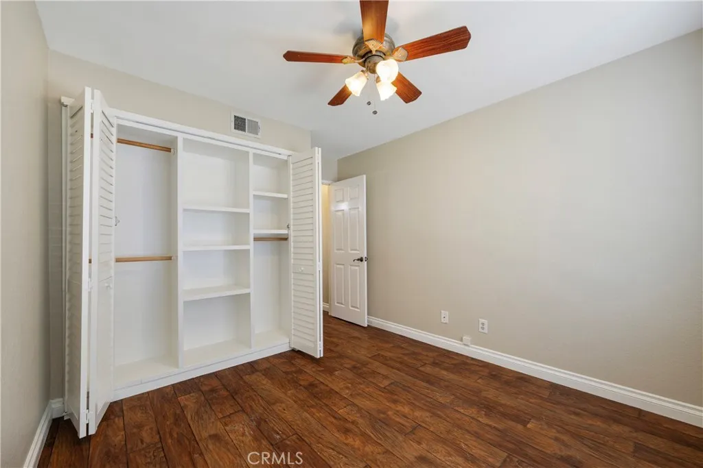 First floor bedroom closet has organizer.