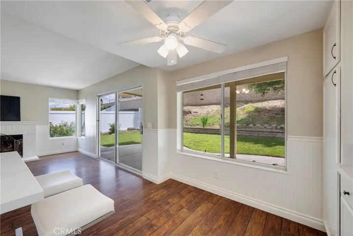 Eat in nook area with fan light has view of the backyard.