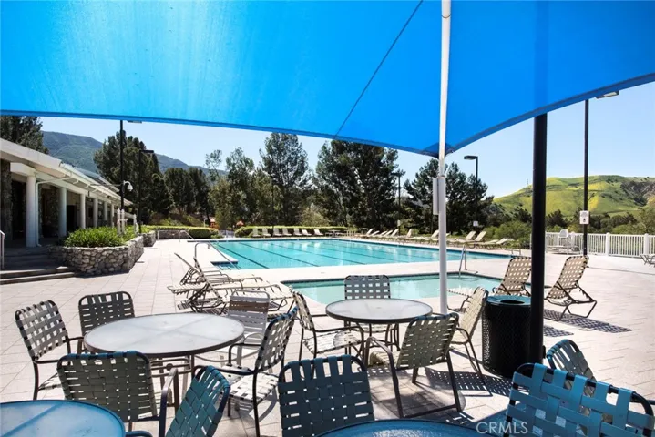 BBQ area next to children’s pool and Association clubhouse.