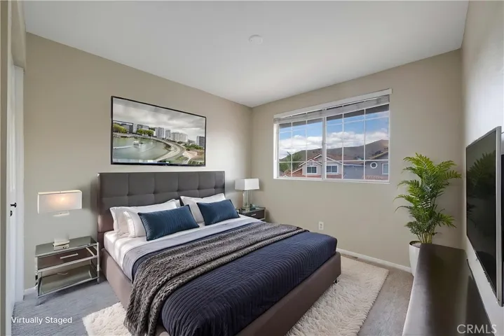 Virtually staged street facing secondary bedroom.