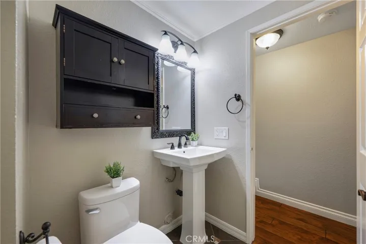 First floor bath has pedestal sink.