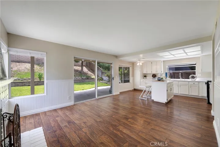 Open concept family room/kitchen with backyard access for family gatherings.
