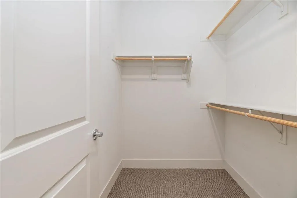 Primary Walk in Closet Primary Walk in Closet