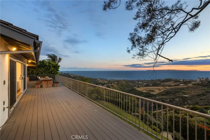 Private and expansive deck runs the length of the home with breathtaking views.