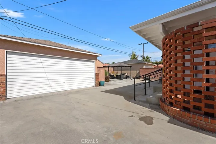 Behind the Gate on driveway there is plenty of room for extra parking plus the 2 car garage
