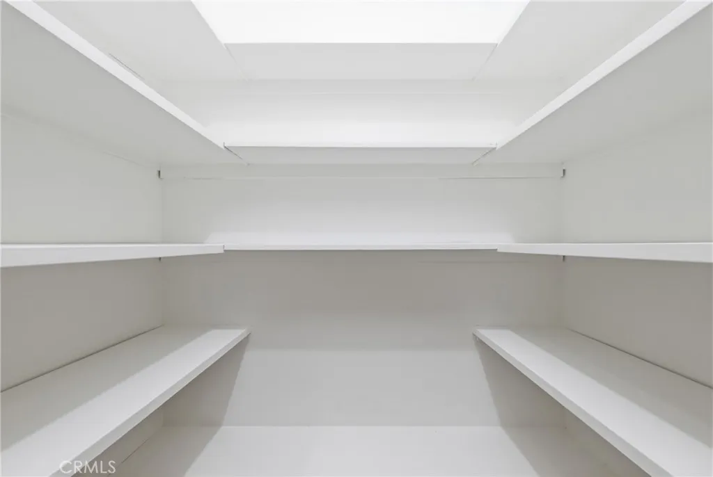 Walk in pantry in laundry room