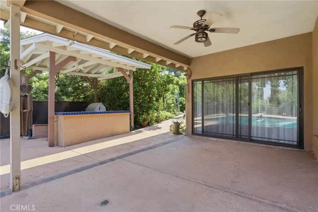 Covered porch with built-in BBQ area