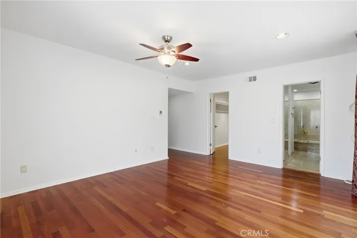 Primary bedroom with walk in closet
