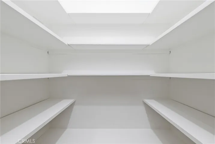 Walk in pantry in laundry room
