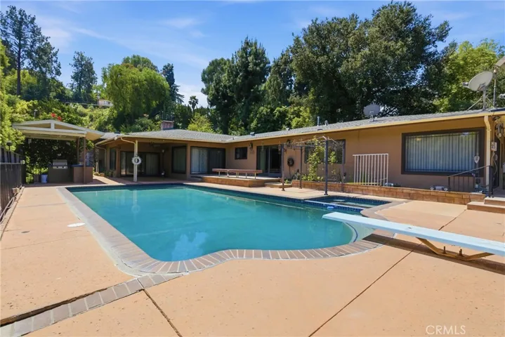 Pool deck with diving board