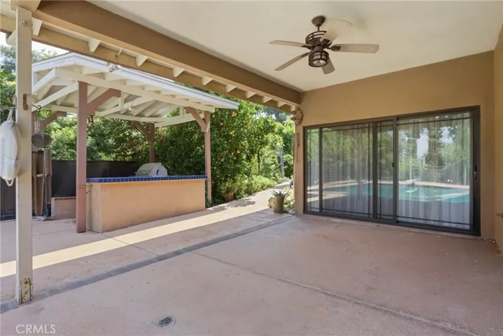 Covered porch with built-in BBQ area