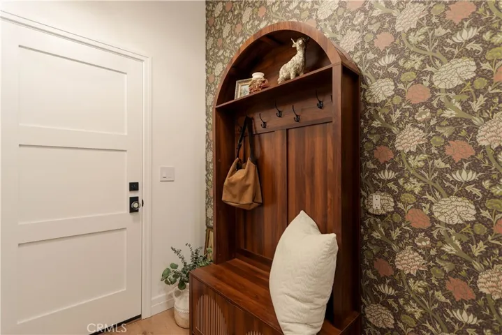 Custom drop station in the pantry is designed specifically for busy, everyday living with dedicated space for backpacks, bags, mail, and daily Essentials.