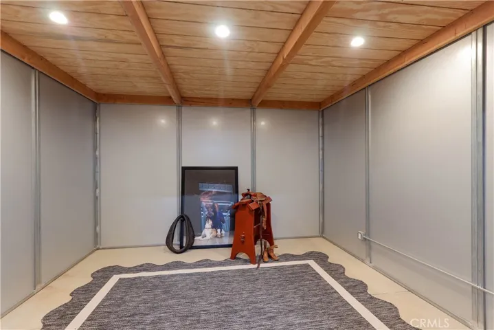 The tack room is ready to support both everyday functionality and elevated equestrian living. There is ample space for saddles, tack equipment and organized storage. It is ready to be customized to suit the needs of the most discerning rider or trainer.