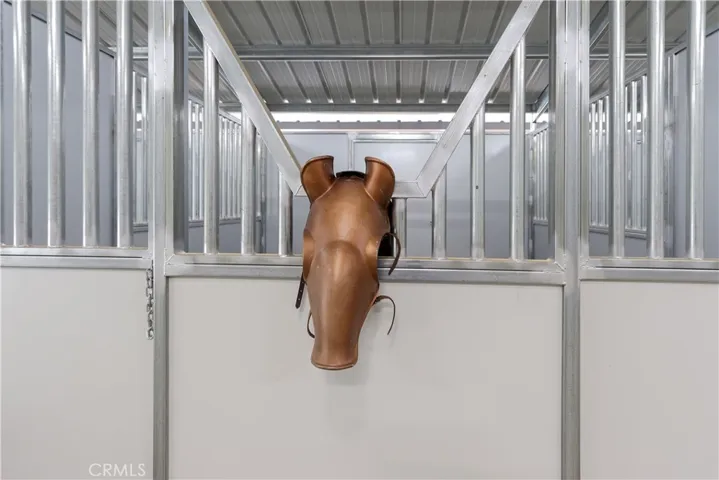 Imagine your treasured horse settling into this brand-new barn designed for refined equestrian living.