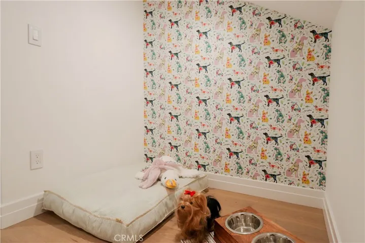 This special home even has a charming alcove for pets!