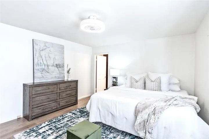 Spacious Primary Suite with Private Bath, Walk-In Shower & Direct Access to the Family Room Retreat
