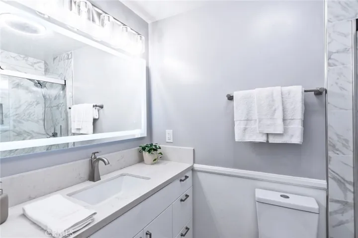 Updated Vanity with Lighted Mirror & Bluetooth Speaker