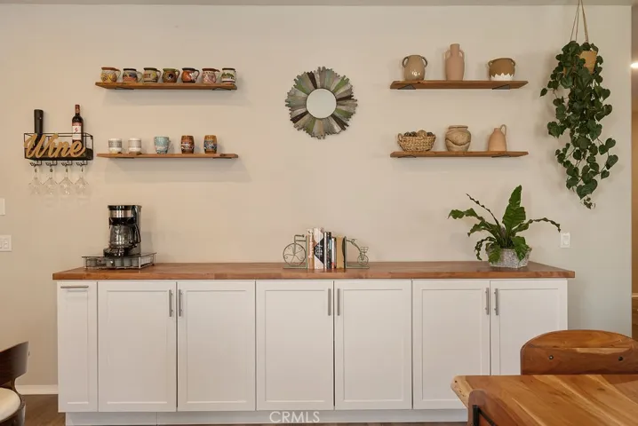 This dry bar/ extra cabinetry is movable.