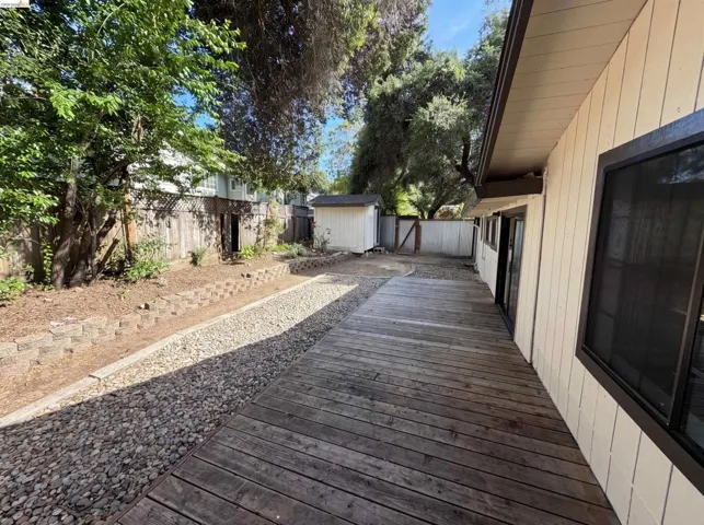 Outdoor decking with wood-finish planks