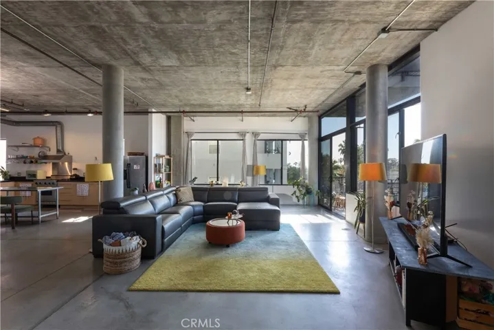 From main sleeping area into living room and kitchen