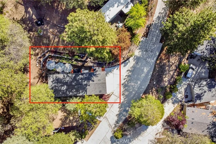 Property lines are not shown in this photo. This aerial image is provided for reference only to illustrate the yard area and parking access and is not intended to depict or define exact property boundaries.