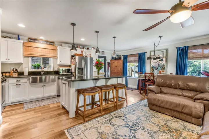 Main floor living Kitchen with farmhouse sink.