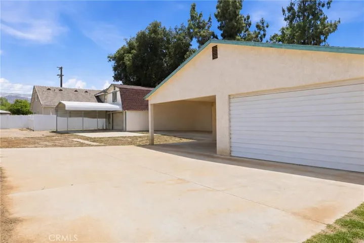 6 car garage with 2 car carport
