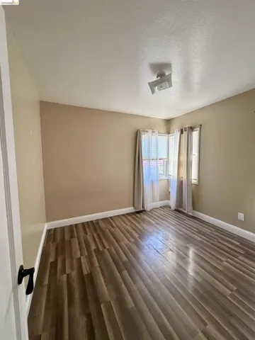 Wood-finish flooring throughout