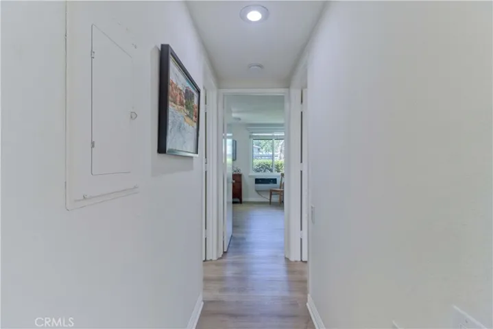 Hallway to primary Bathroom and Bedroom