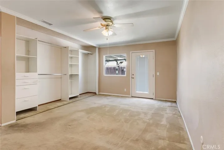 Primary bedroom has a private patio and large open closet.