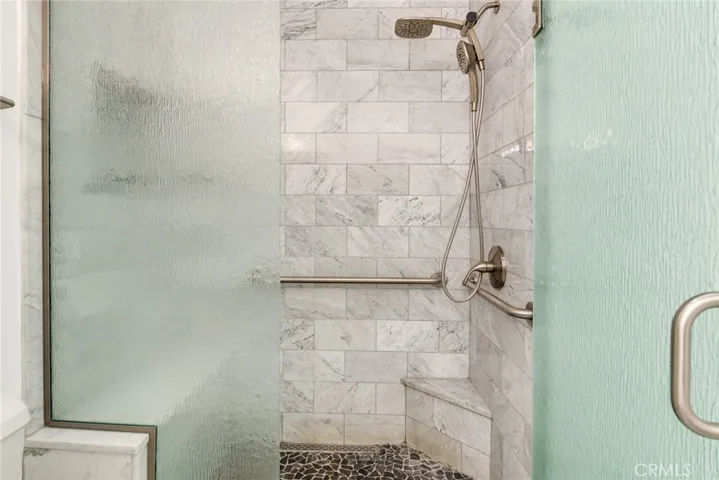 Updated walk in shower in the primary bathroom.