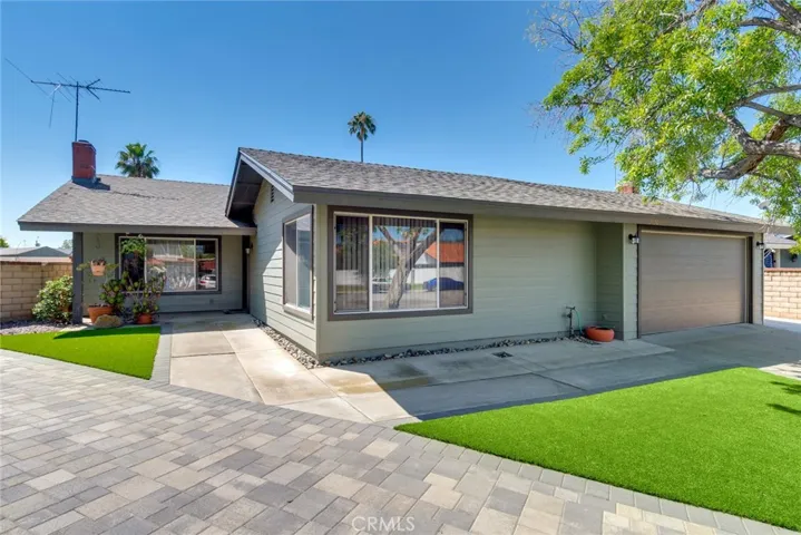 Private front entry set back from street, just behind the attached 2 car garage and bonus room.
