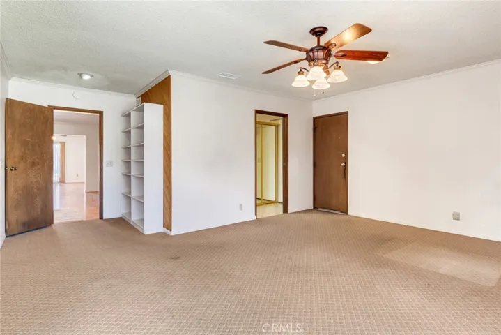 View from bonus room showing access to garage, laundry room, and main living spaces.