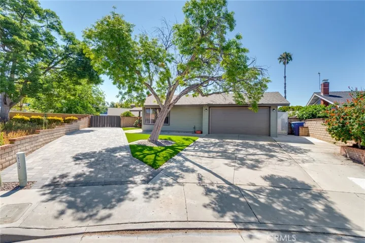 Great curb appeal! Pavered driveway and artificial turf installed about 1 1/2 years ago.