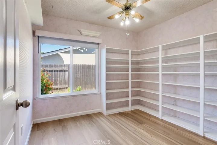 Bedroom #3 has built in shelving and a closet.