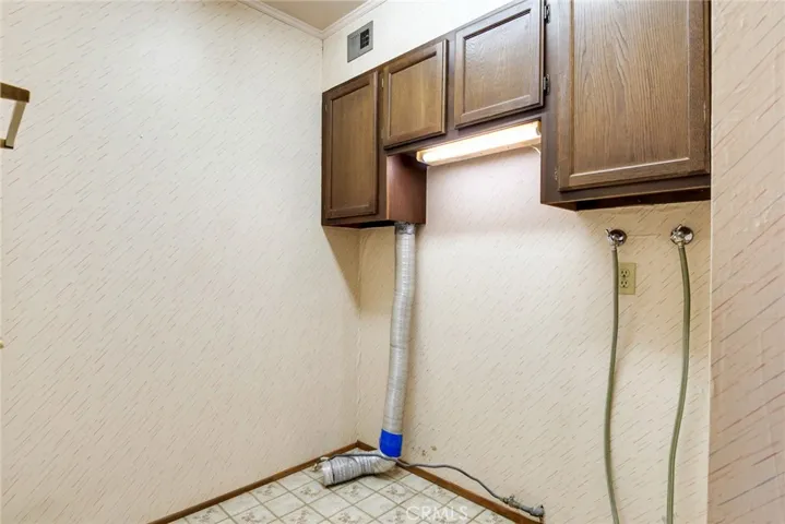 Indoor laundry room, accessed from bonus room.