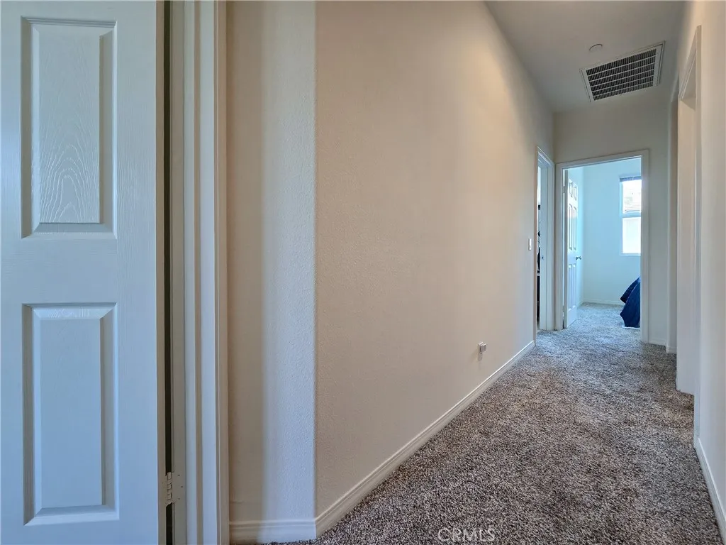 Hallway to bedrooms & bath