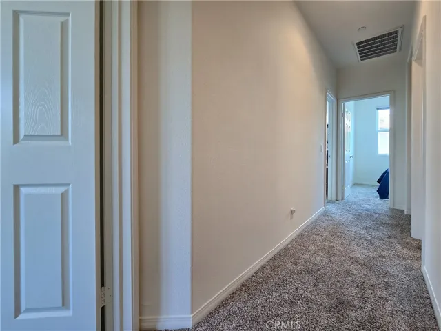 Hallway to bedrooms & bath