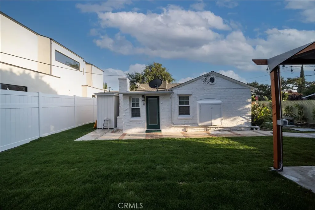View of rear of home from new lawn