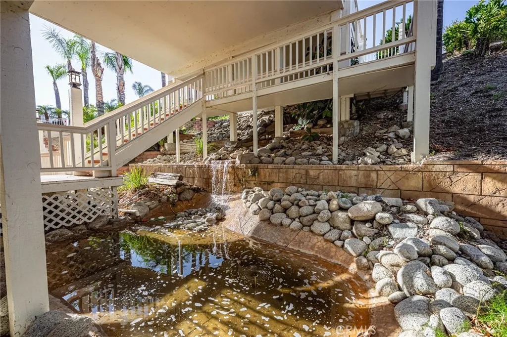 Waterfall to pond, an inviting entry to your home