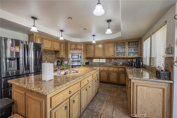Kitchen w/ Island & Granite Counter tops