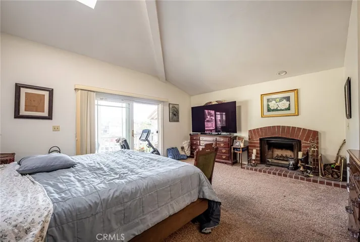 Primary Bedroom with Fireplace and views