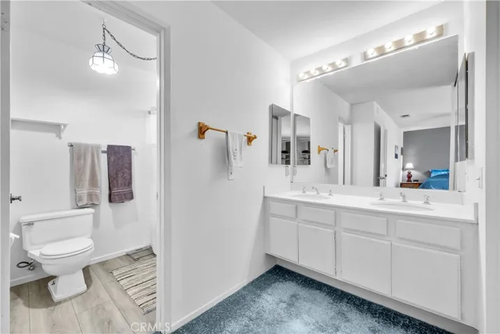 Primary Suite bath features double sinks.