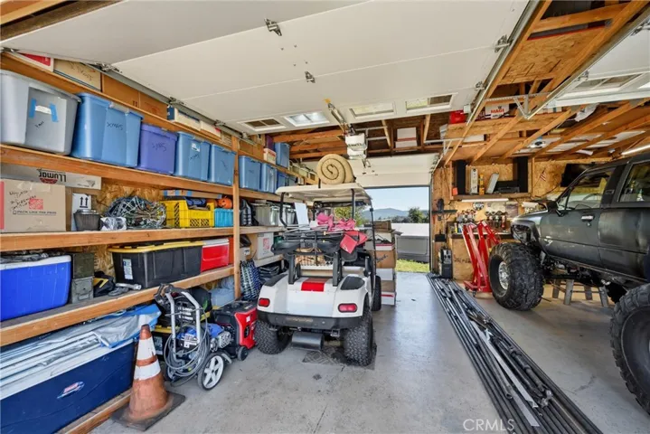 Garage has door to rear of property, for drive through convenience.