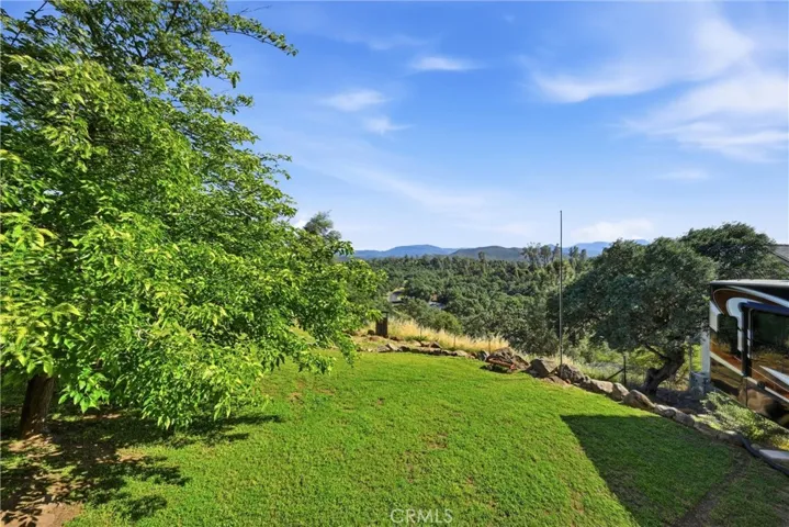 Large yard with sweeping mountain views.